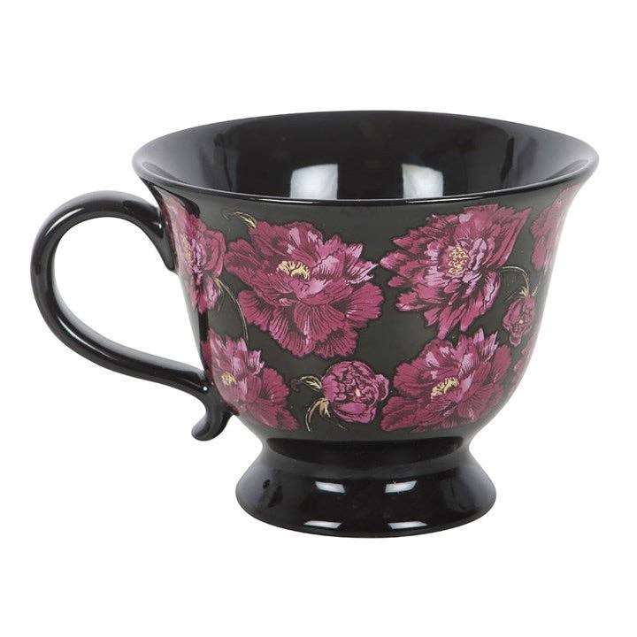 Teetasse mit dunklem, romantischem Blumenmuster