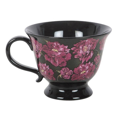 Teetasse mit dunklem, romantischem Blumenmuster