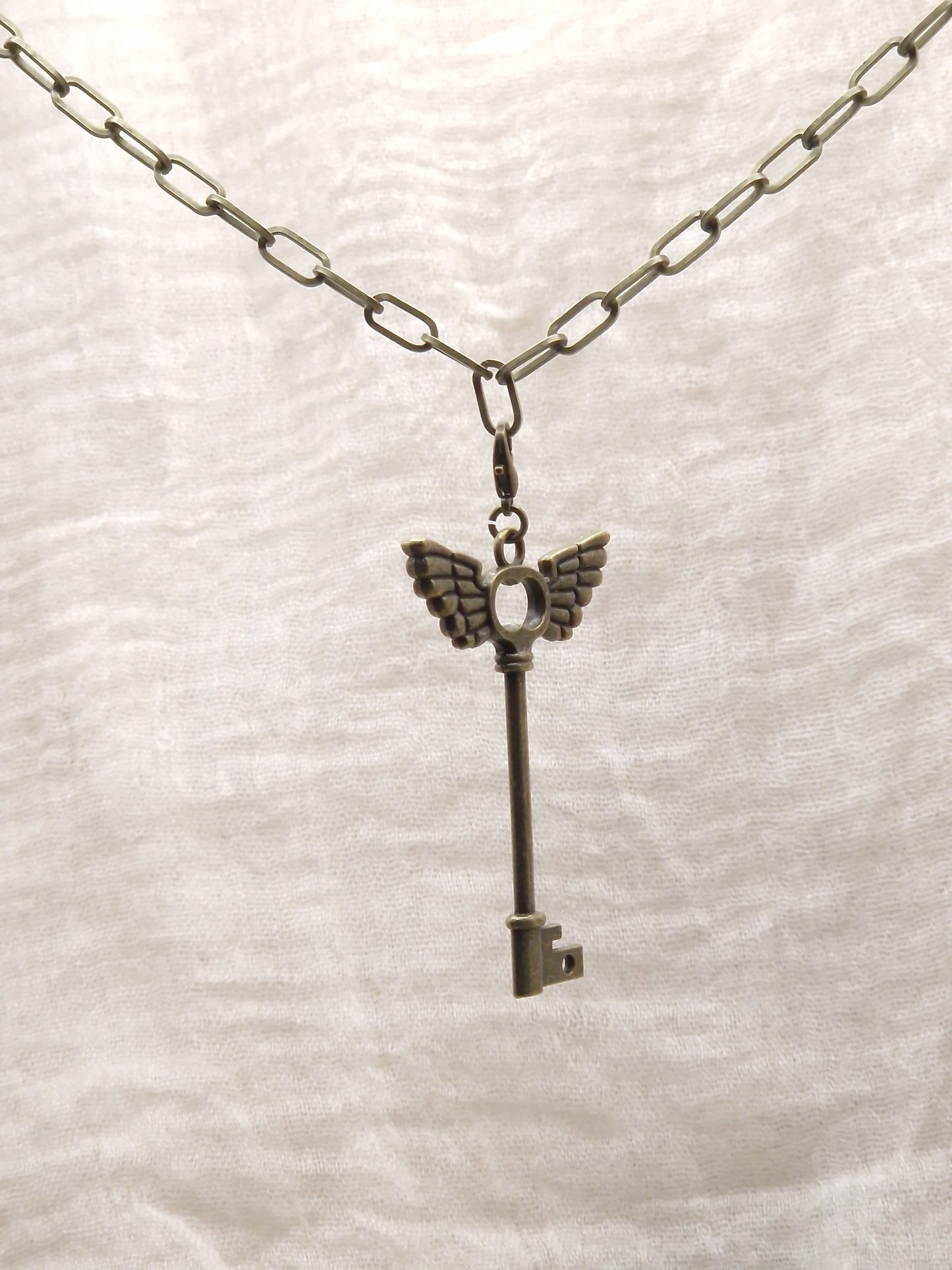 Schlüssel mit Flügel Charm