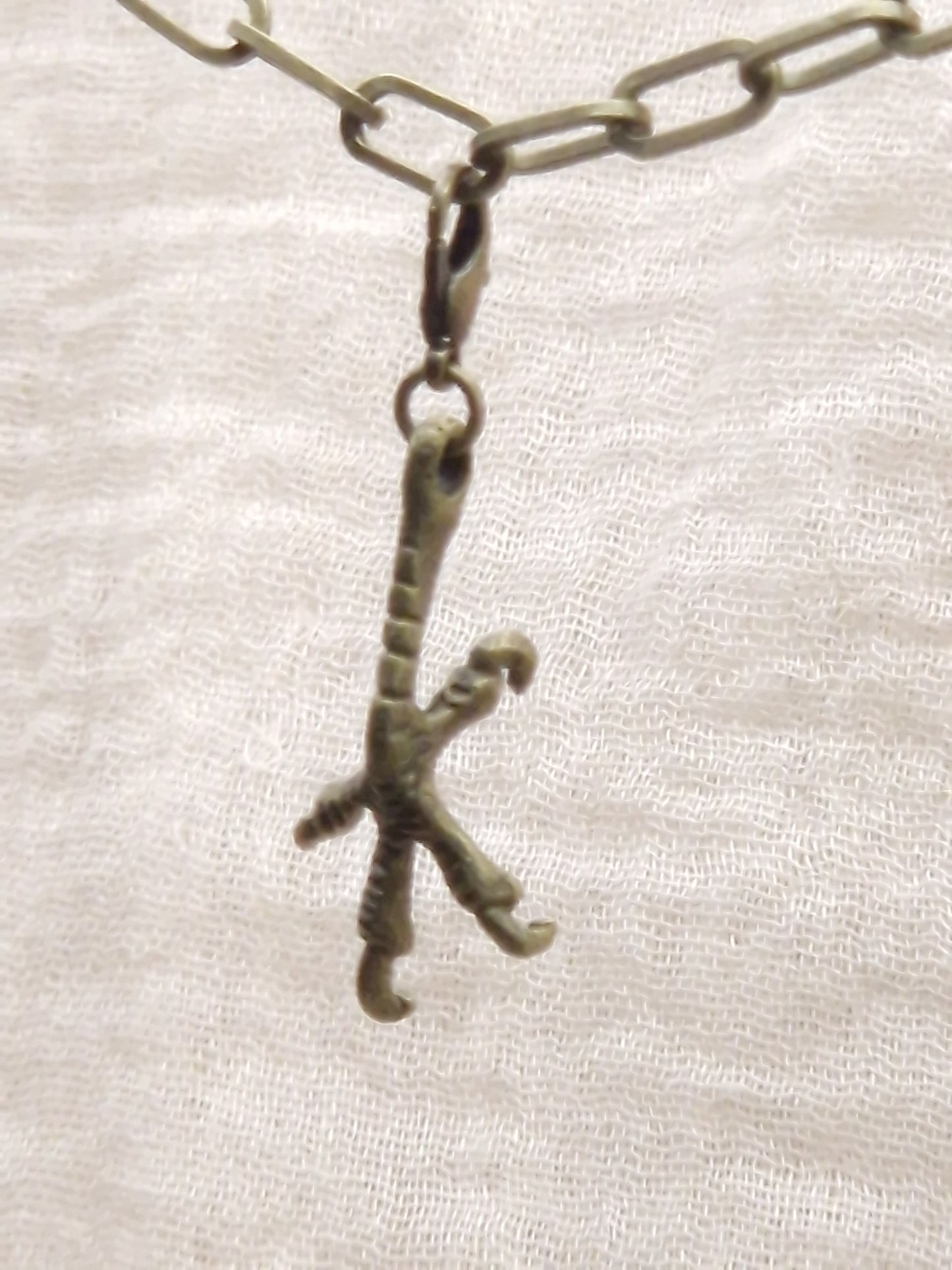 Hühnerkrallen Charm