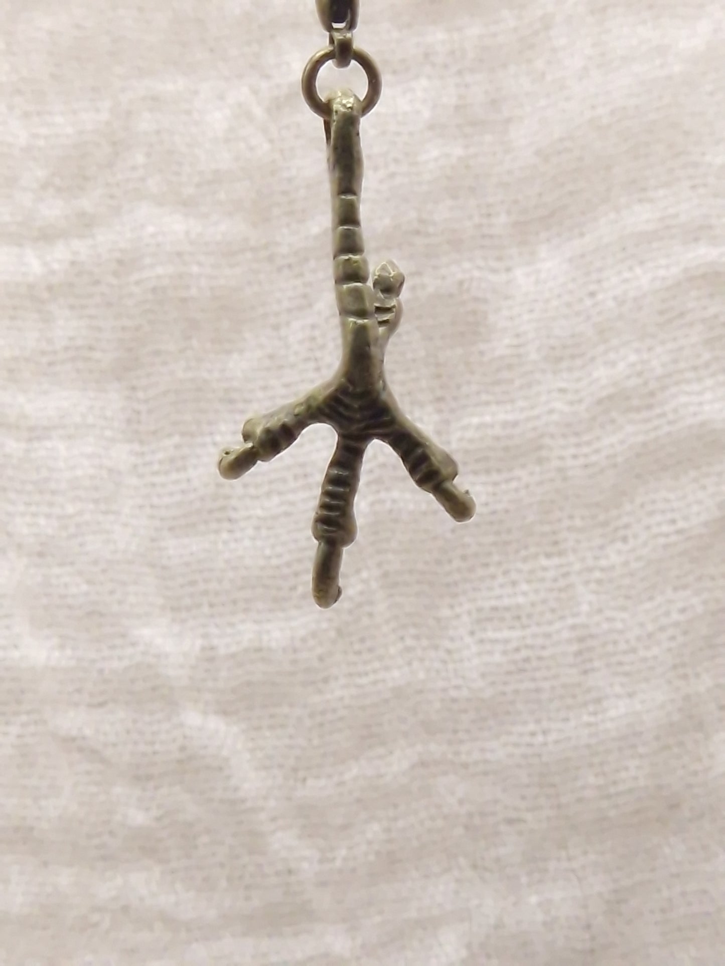 Hühnerkrallen Charm